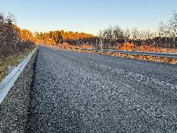 В Югорске-2 провели ремонт дороги возле КОС-500